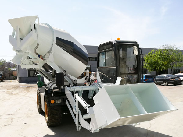 Self mixing concrete truck